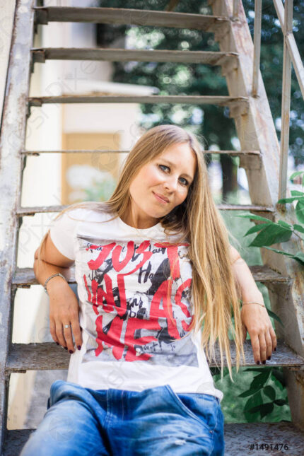 european-girl-jeans-tshirt-sitting-1491476