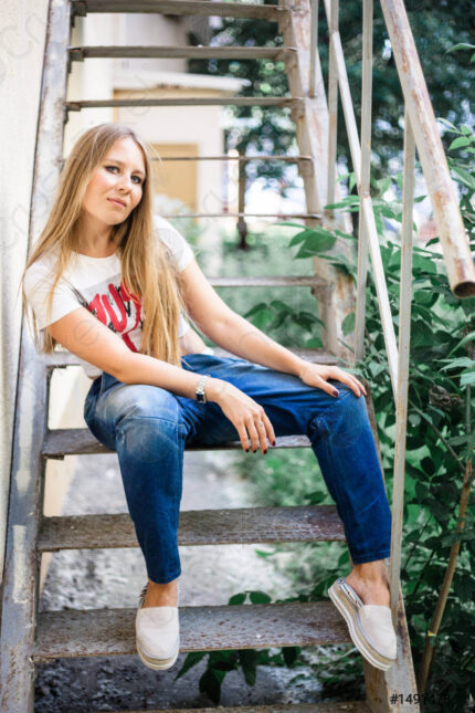 european-girl-jeans-tshirt-sitting-1491478